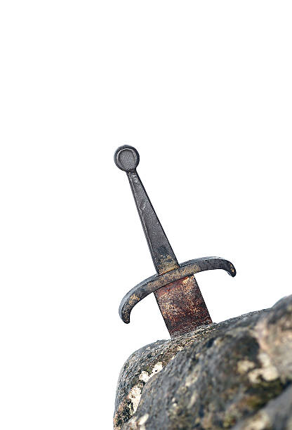 istock legendary Excalibur sword into the stone 512288354