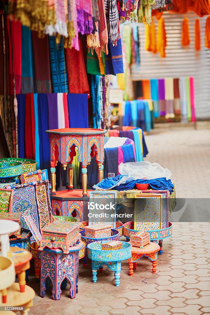 Selection of wooden furniture on a traditional Moroccan market Selection of wooden furniture on a traditional Moroccan market (souk) in Marrakech, Morocco Africa Stock Photo