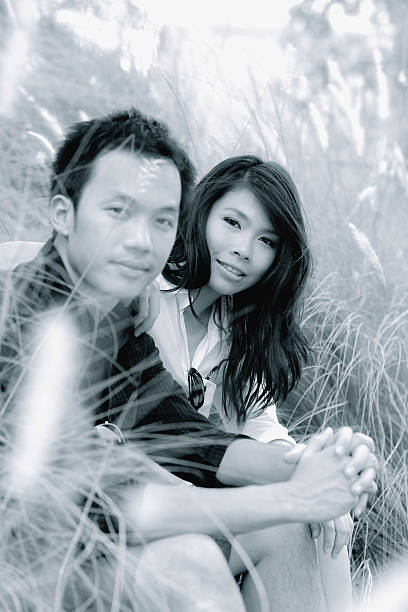 istock B&W / Cheerful young newlywedshugging tenderly 512289871