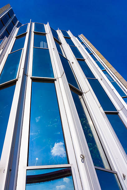 istock glass silhouettes on modern building 512291441
