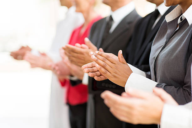 istock group of businesspeople clapping hands 512293269