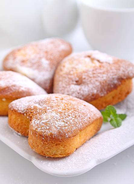 istock muffins in the form of heart with powdered sugar 512293688
