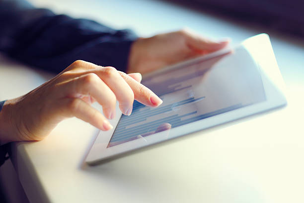 istock Businesswoman holding digital tablet 512293997