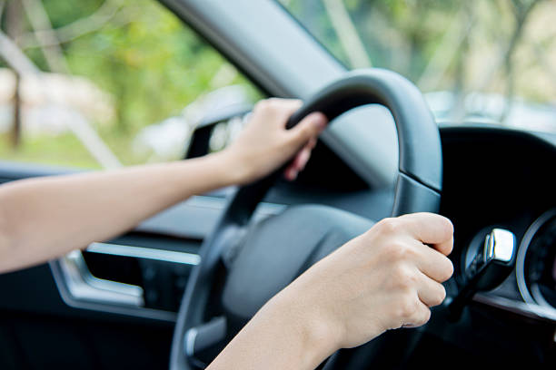 istock Woman hand driving 512294226