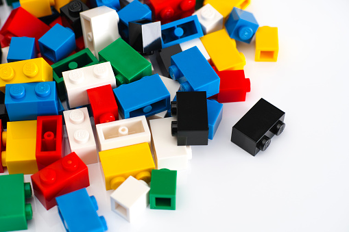 Tambov, Russian Federation - February 19, 2015: Heap of multicolor Lego Blocks on a white background. Studio shot.