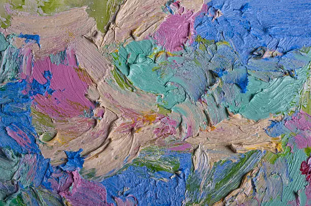 Background image of bright oil-paint palette