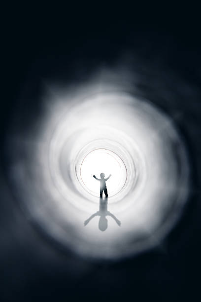 istock Figure Of Toddler Walking To Light 512296372