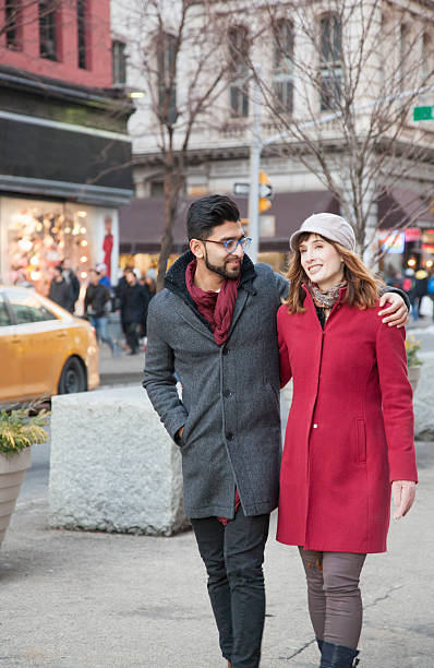 istock Multi-Ethnic Couple embracing in the city 512298236