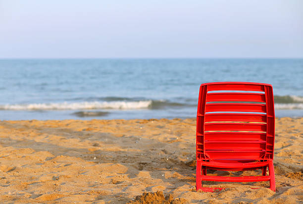 istock beach chair by the sea in summer 512298860