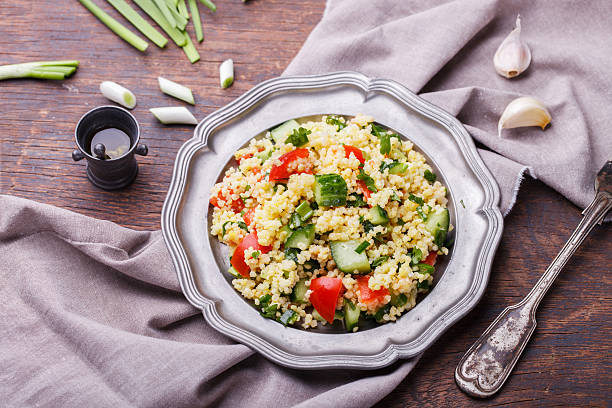 istock Tabbouleh, an Arabian vegetarian salad 512299598