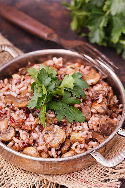 istock Rice with mushrooms  and fresh parsley 512300176