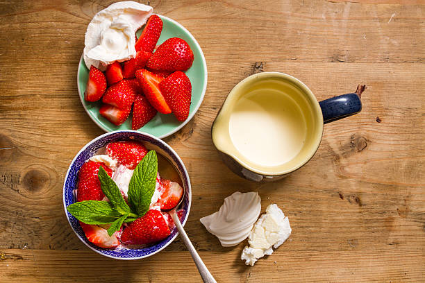 istock Meringue, cream and strawberries dessert 512309199