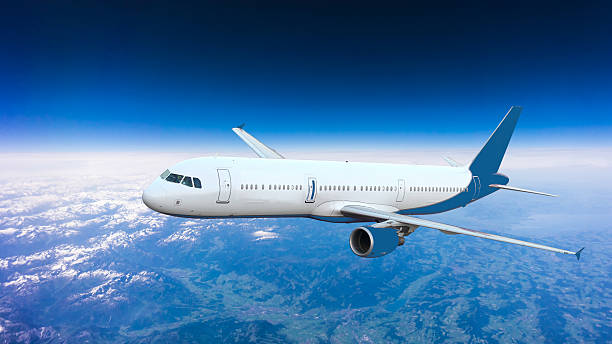 istock aeroplane.  Airplane over the mountains 512309961