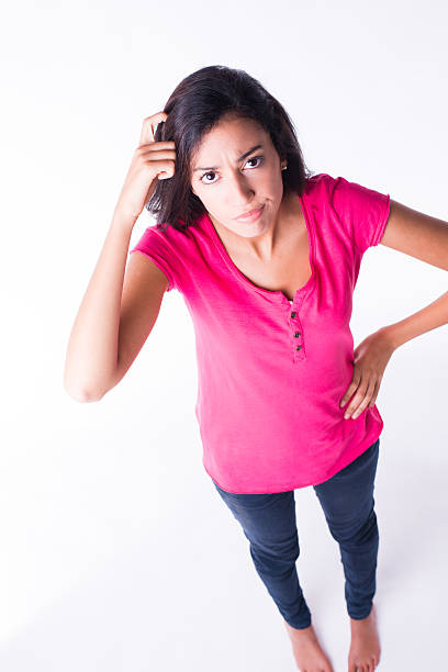 isolated studio shot beautiful young woman wonder attitude with finger