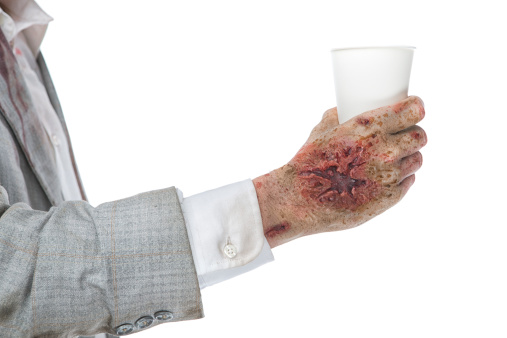 Zombie holding a cup
