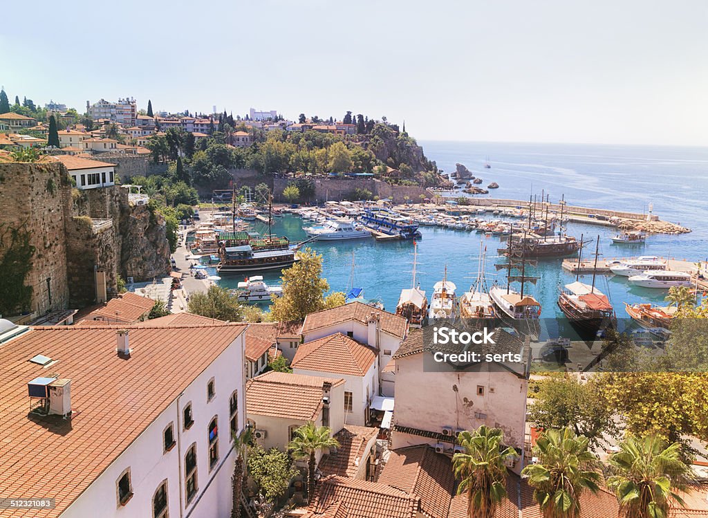 Old town Kaleici in Antalya, Turkey Famous old harbor in Antalya with boats, ships and yachts anchored in it. Antalya Province Stock Photo