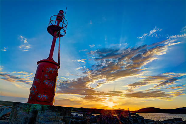 latarnia morska na zachód słońca - lighthouse night hdr dark zdjęcia i obrazy z banku zdjęć