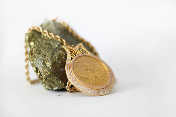 istock gold mine and gold necklace 512321573