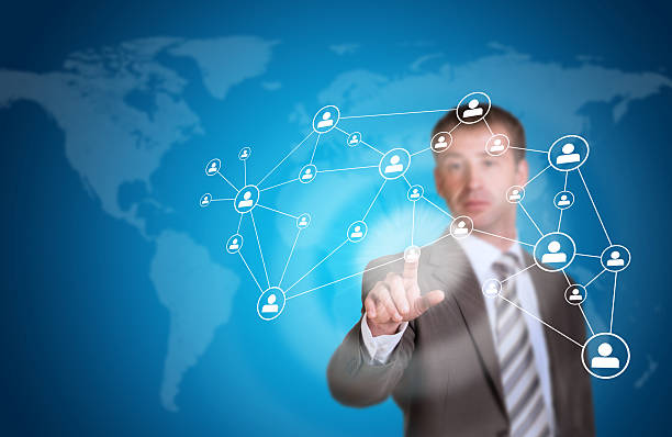 istock Business man pointing her finger at network icons 512322649