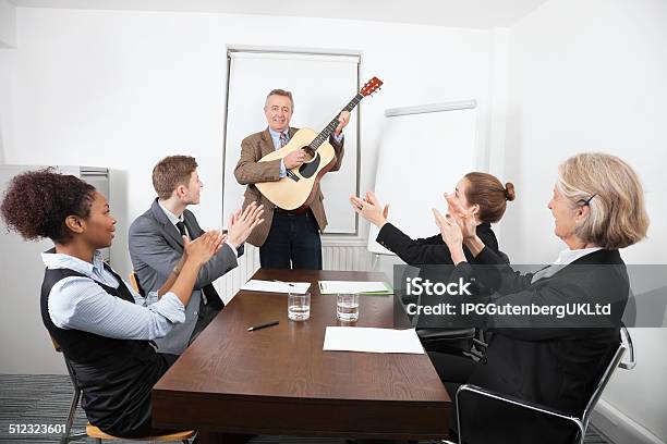 Business Person In The Office Stock Photo - Download Image Now - Business Meeting, Guitar, Board Room