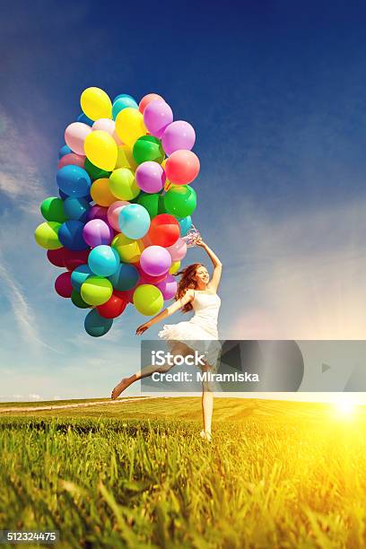 Happy Birthday Woman Against The Sky With Rainbow Air Balloons Stock Photo - Download Image Now