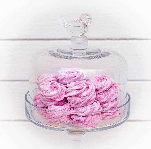 istock pink marshmallow glass bowl on white background 512324787