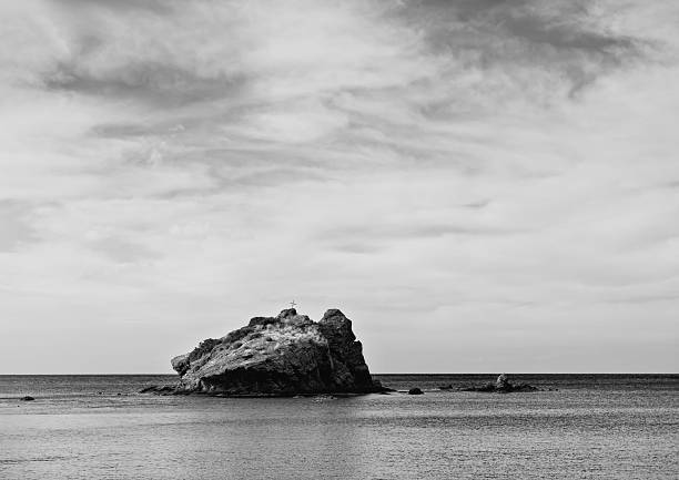 unusually purple rocky island in mediterranean sea in cyprus