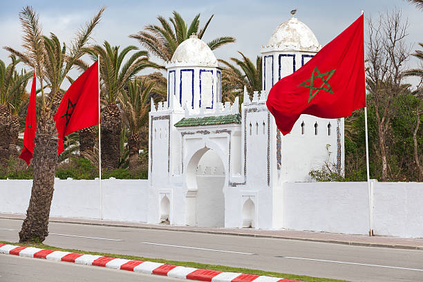 istock Ancient white gate to the park in Tangier, Morocco 512325377