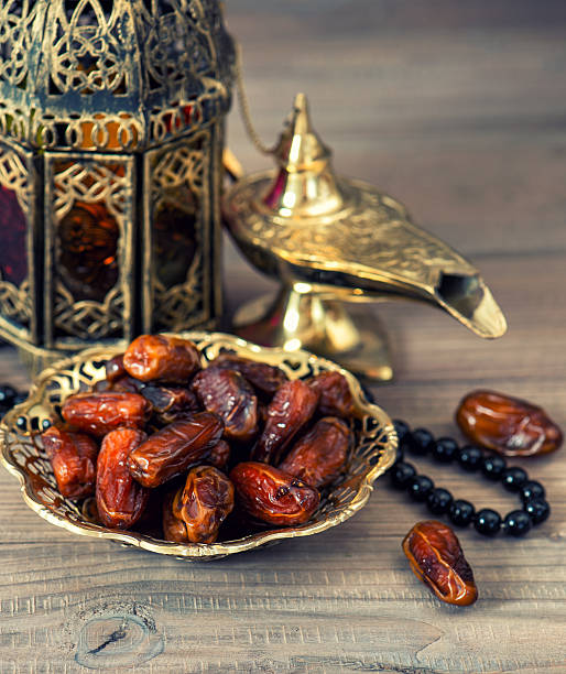 istock Traditional arabic lamp, latern, dates and rosary 512325913