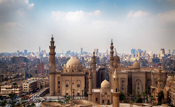 View of the Mosques of Sultan Hassan and Al-Rifai View of the Mosques of Sultan Hassan and Al-Refai in Cairo - Egypt sultan stock pictures, royalty-free photos & images