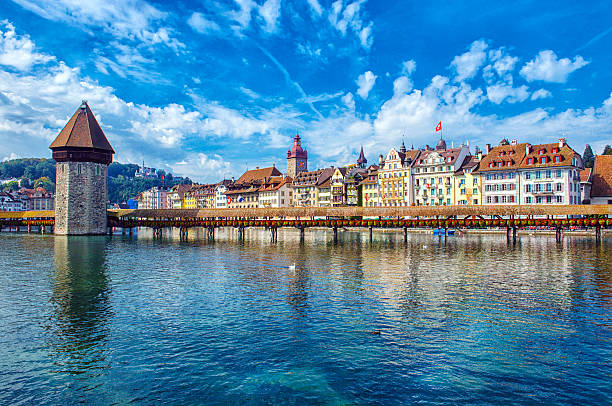 istock Old Tower and Bridge at Lucerne Switzerland 512330394