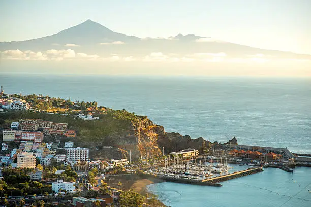 San Sebastian cityscape view on La Gomera island with Tenerife island on the background on the morning
