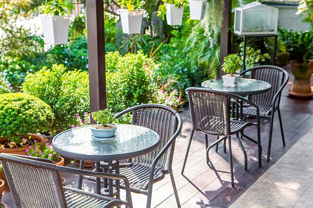 istock Empty table and chair on the garden background 512331852