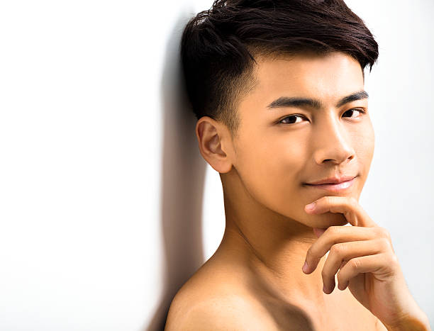 grande retrato de atraente jovem rosto - human face chinese ethnicity close up men imagens e fotografias de stock