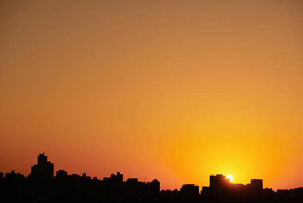 istock City silhoutte in sunset. 512333806