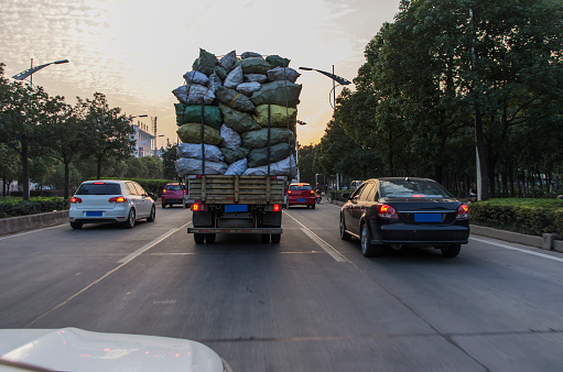Overloaded truck on road