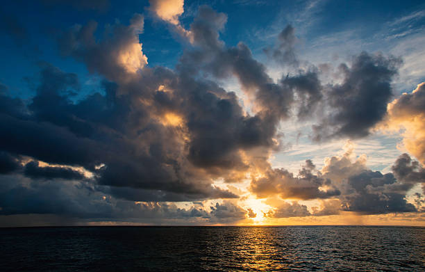 istock Beautiful cloudy sky at sunset in the tropics 512337762