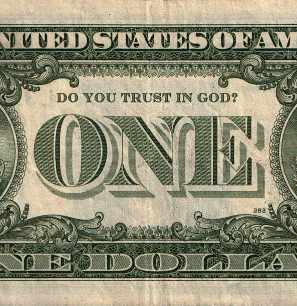 istock One dollar banknote with question Do You trust in God? 512340694