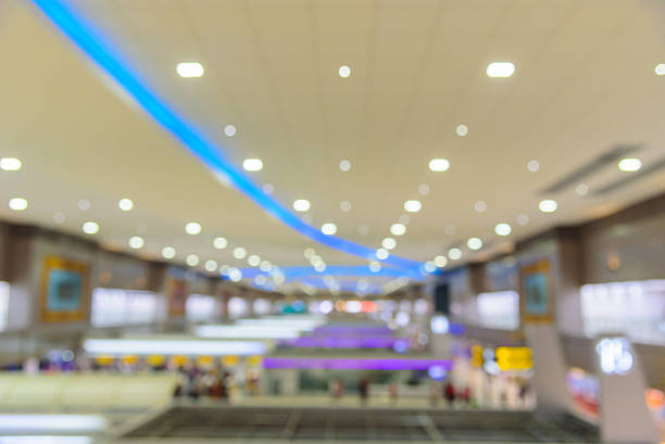 istock Blurred Inside the airport terminal with bokeh light background. 512343190