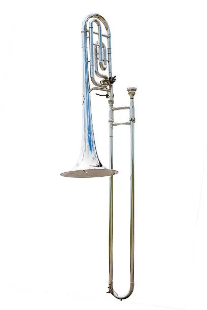 Photo of Silver trombone on white background