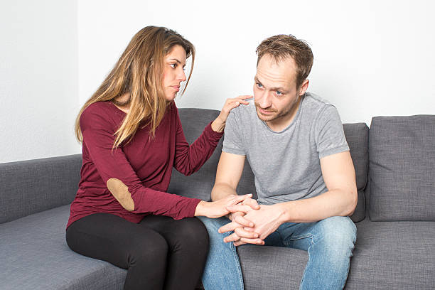istock Girlfriend comforting her boyfriend 512351036