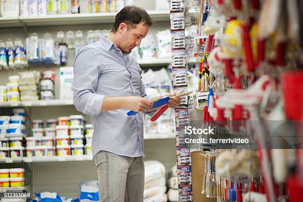 Man In A Hardware Store Stock Photo - Download Image Now - Hardware Store, Store, Shopping