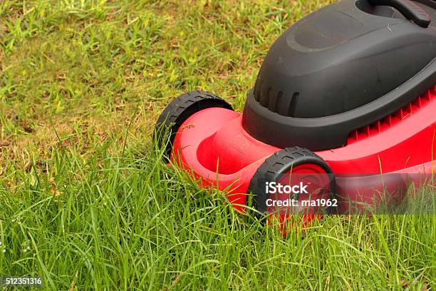 Lawnmower Mowing The Grass Stock Photo - Download Image Now - Agricultural Field, Chores, Close-up