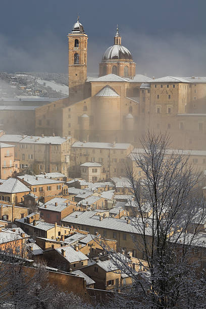 istock The cathedral of Urbino during winter snowfall. 512352024