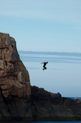 Perros-Guirec,France, 30th august 2013 : a man jump off a cliff