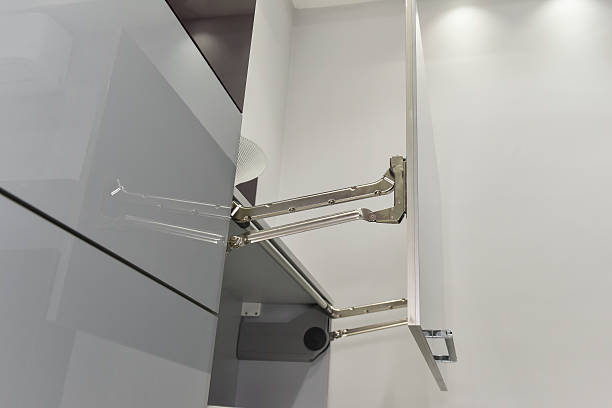 istock Closeup detail of a hinge on kitchen cupboard 512357426