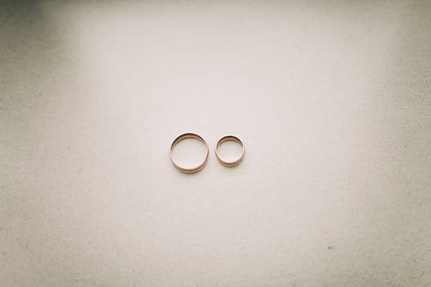istock luxury wedding rings with stylish decoration near them 512357840