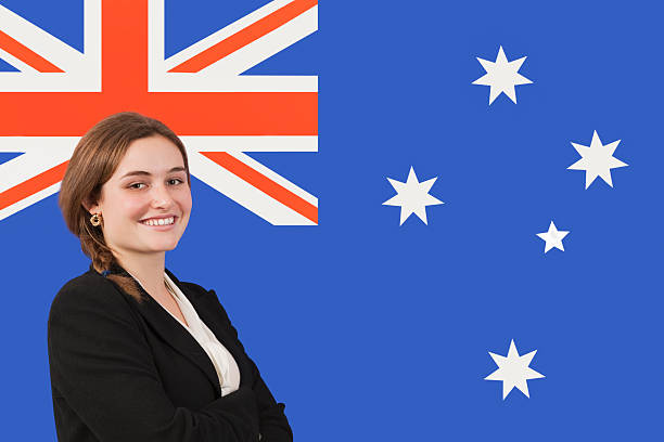 istock Business person in front of flag 512358285