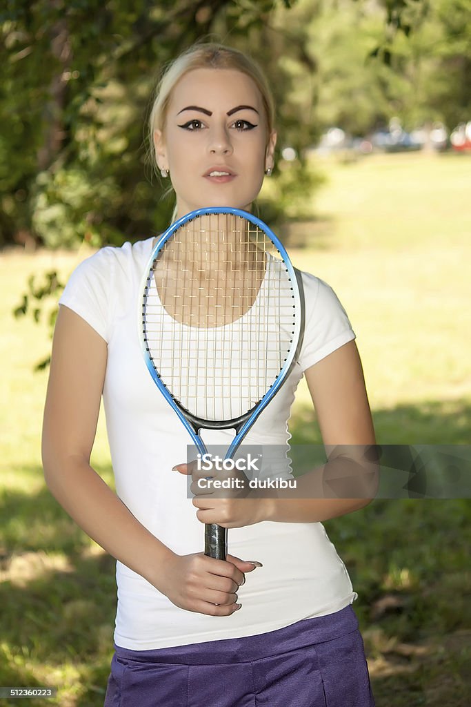 attractive female tennis player portrait of attractive female tennis player Activity Stock Photo