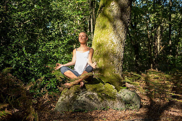 istock Woman exercising yoga 512387527